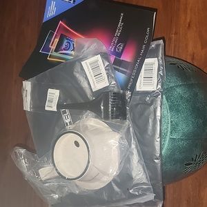 New still in package Paul Mitchell Aprons and color bowl.